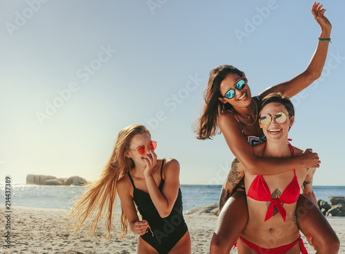 Girlfriends enjoying on beach