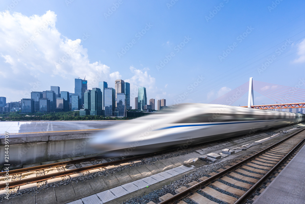 high speed train with city skyline