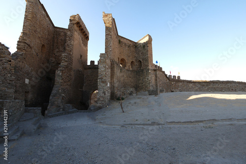 entrance to the arch and defensive walls on the ruins of an ancient castle with remains of the towers of the Genoese fortress. Crimea photo