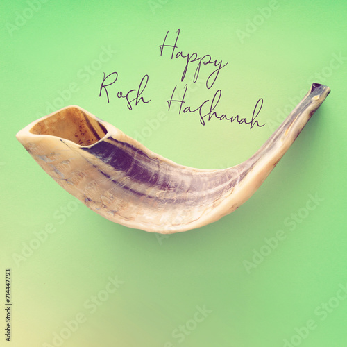 Rosh hashanah (jewish New Year holiday) concept. SHOFAR (HORN) Traditional symbol.