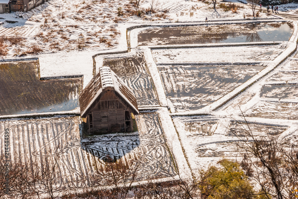 Top view of Shirakawa-go village, Japan with snow covering and autumn leaves foreground