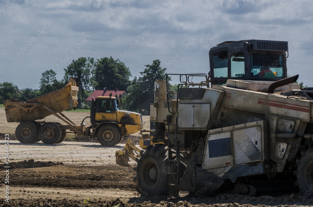 CONSTRUCTION MACHINES - Vehicles on the construction site CONSTRUCTION MACHINES - Vehicles on the construction site