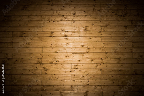 Dark woode wall background with circular light