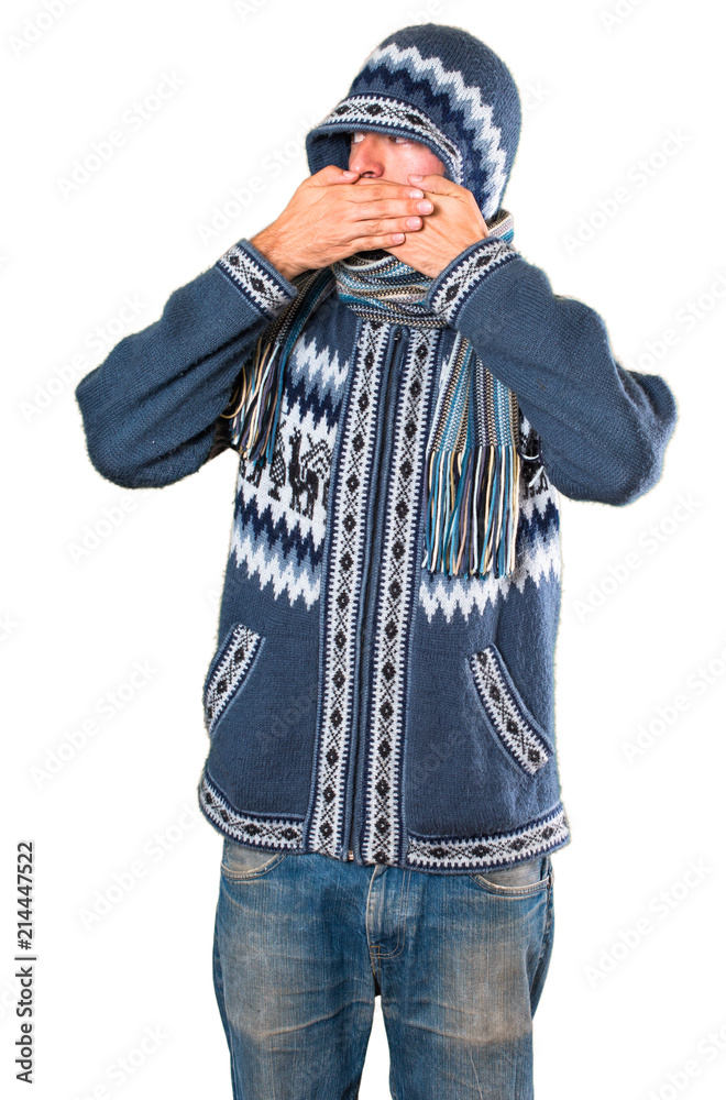 Man with winter clothes covering his mouth Man with winter clothes covering his mouth