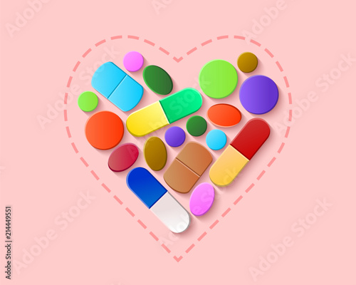 Colorful pills, tablets and capsules arranged in a heart shape on a light pink and rosa background. Health and pharmaceutical medicine concept.