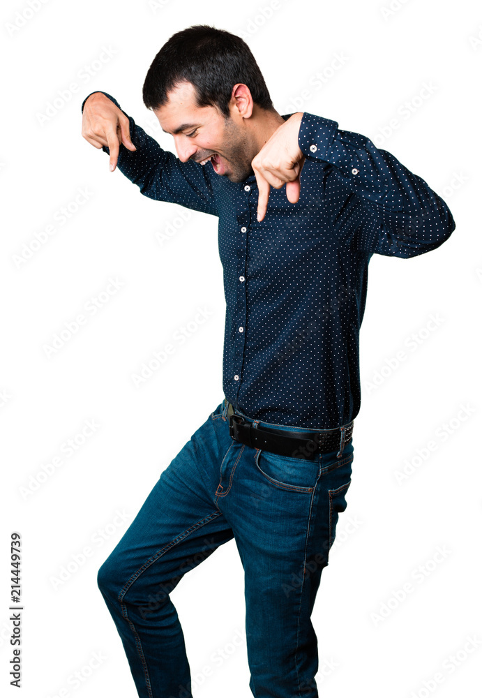Handsome man pointing down on isolated white background Handsome man pointing down on isolated white background