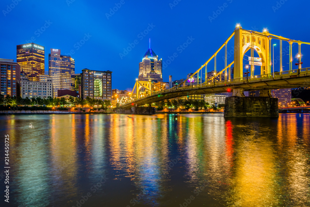 The Roberto Clemente Bridge and Pittsburgh skyline at night, seen from Allegheny Landing, in Pittsburgh, Pennsylvania.
