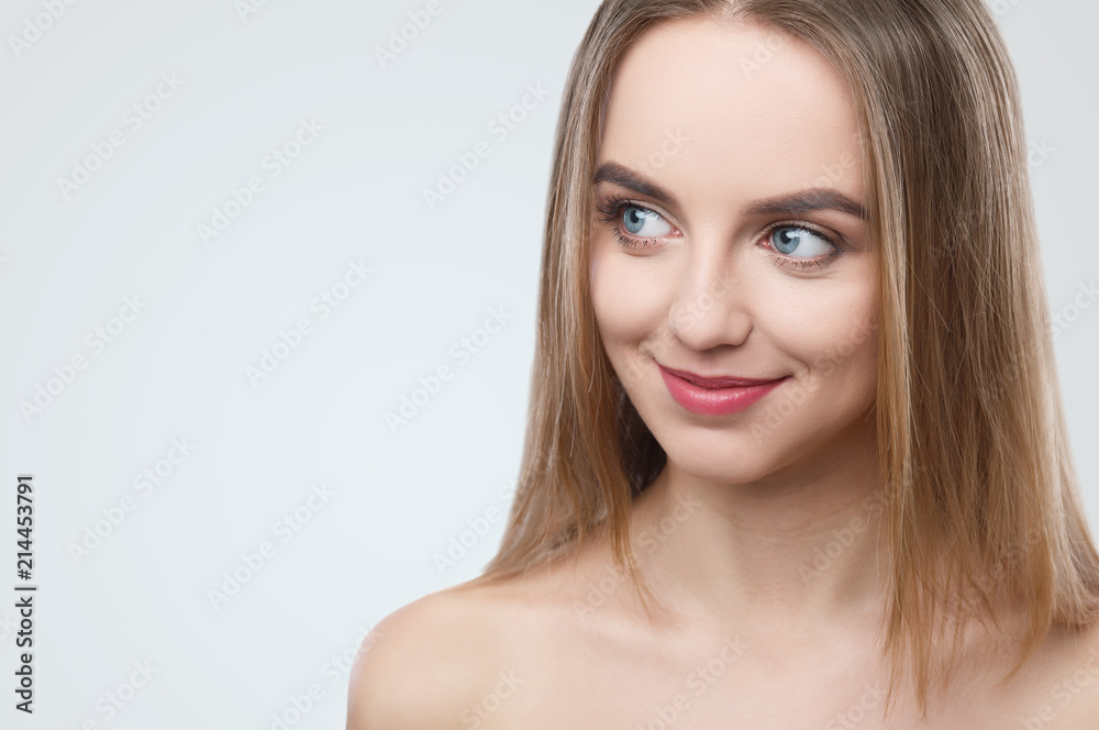 Fototapeta premium Smiling beautiful girl with professional make up