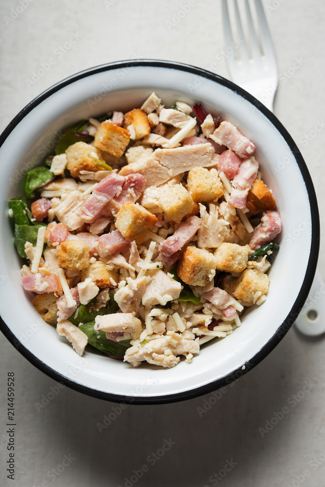 Chicken caesar salad with croutons and parmesan Chicken caesar salad with croutons and parmesan