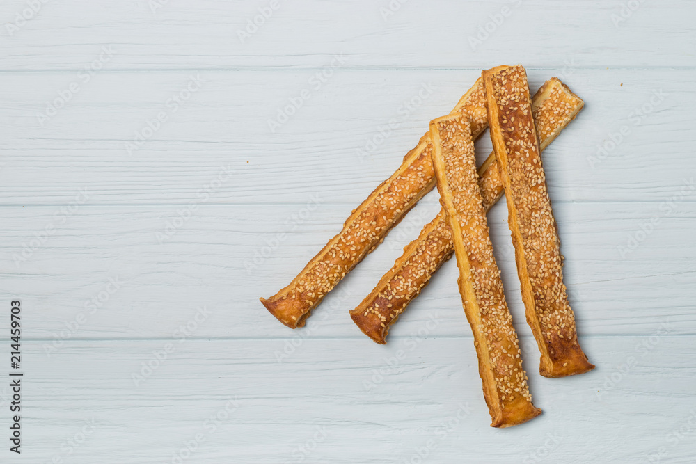 salted crispy cookies with sesame seeds on white background salted crispy cookies with sesame seeds on white background