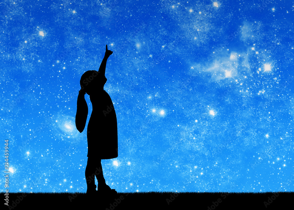 Silhouette, little baby girl looking at starry sky and showing thumb up