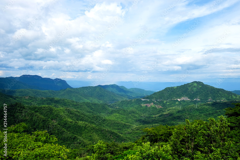 Fototapeta premium Landsacpe of forested mountain with the cloud and fog