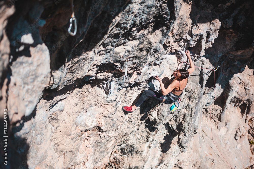 A climber climbs the rock.