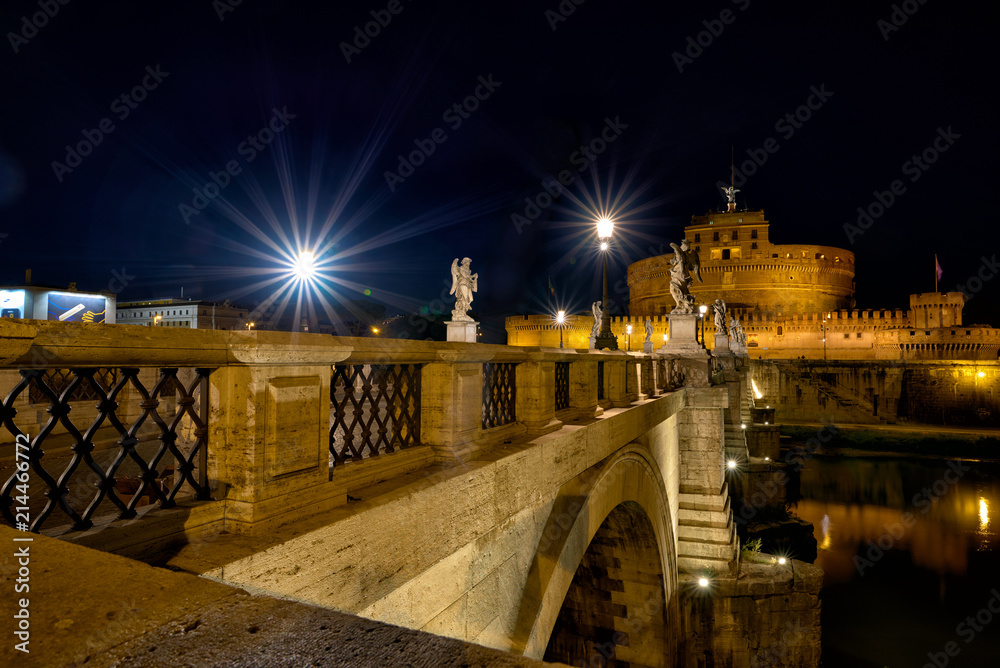 Ponte Sant'Angelo (Aelius Bridge)  across the Tiber River in Rome at night