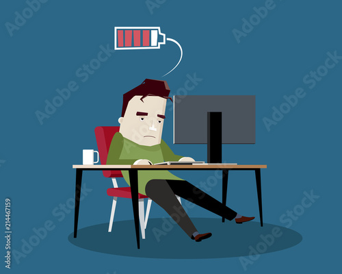 Tired or Stressed Man Sitting in front of Computer