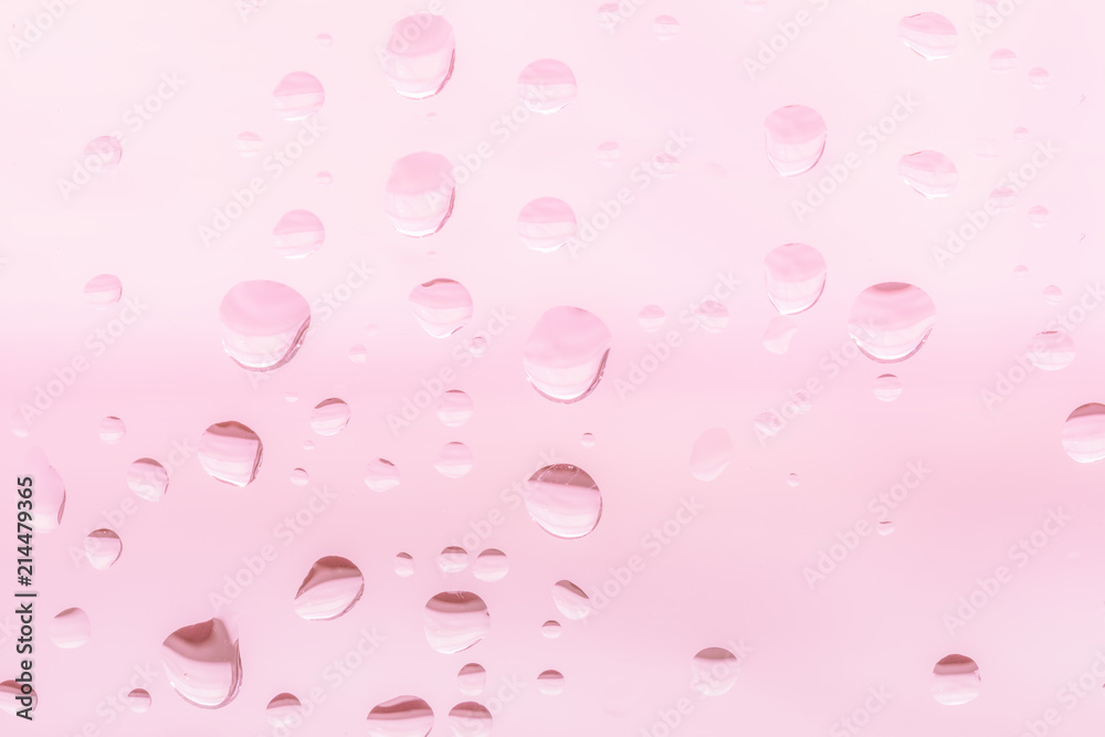 Background image, water drops on glass, dyed with pink. Background image, water drops on glass, dyed with pink.