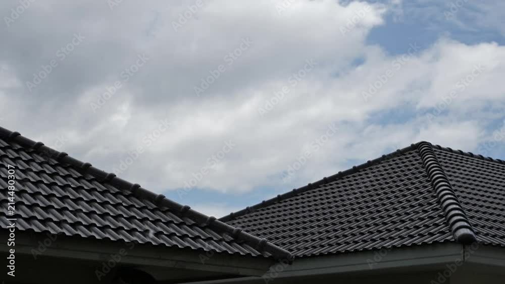 slow motion rainy day scene, water pouring rain falling on roof house slow motion rainy day scene, water pouring rain falling on roof house