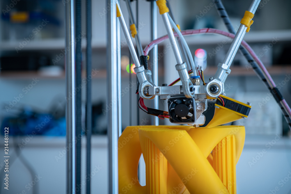 Print parts on a delta 3D printer in industrial lab Print parts on a delta 3D printer in industrial lab