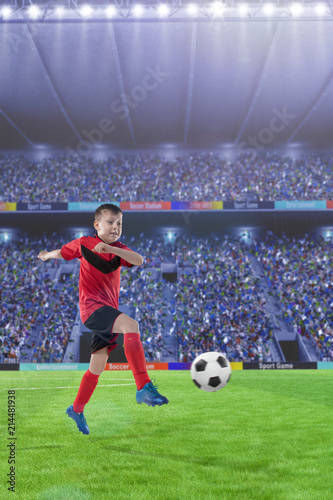 kid football player kicking the ball © 27mistral