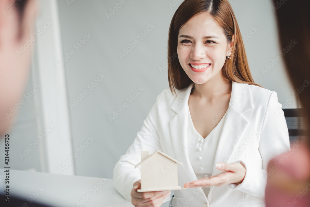Seller presenting new home /house to business people, marketing for home, condominium and residence concept Seller presenting new home /house to business people, marketing for home, condominium and residence concept