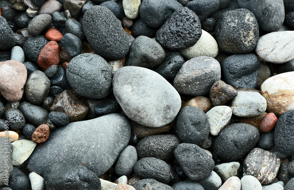 Colorful of stones volcano on Black beach,Thira Island Santorini Greece for wallpaper and texture. Colorful of stones volcano on Black beach,Thira Island Santorini Greece for wallpaper and texture.