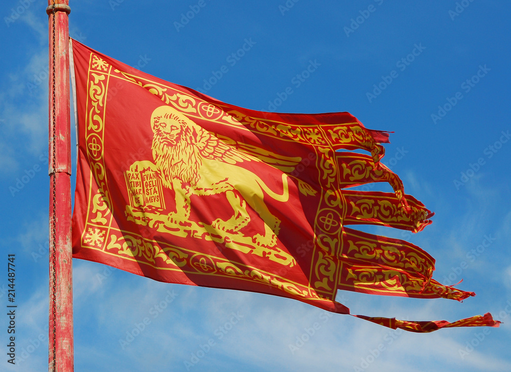Obraz premium Old Venice Republic Flag with Saint Mark Lion fluttering in the wind