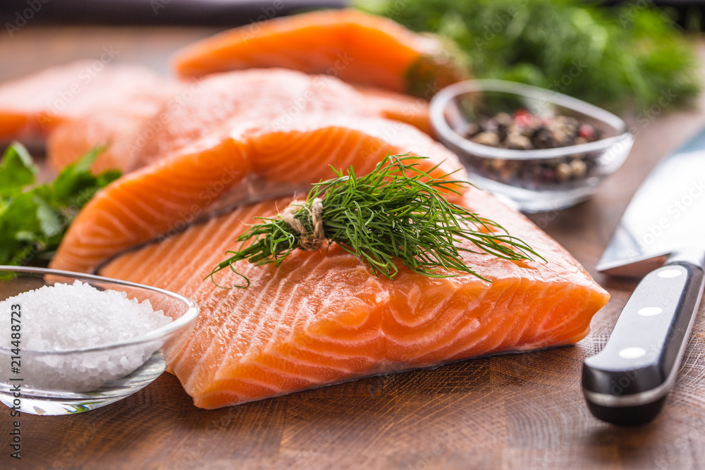 Raw salmon fillet with dill lemon olive oil salt and pepper Raw salmon fillet with dill lemon olive oil salt and pepper