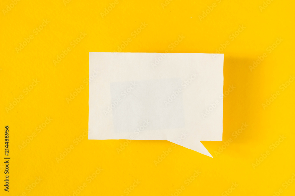 Symbol sign message from a white paper on a yellow background, social network, message Symbol sign message from a white paper on a yellow background, social network, message