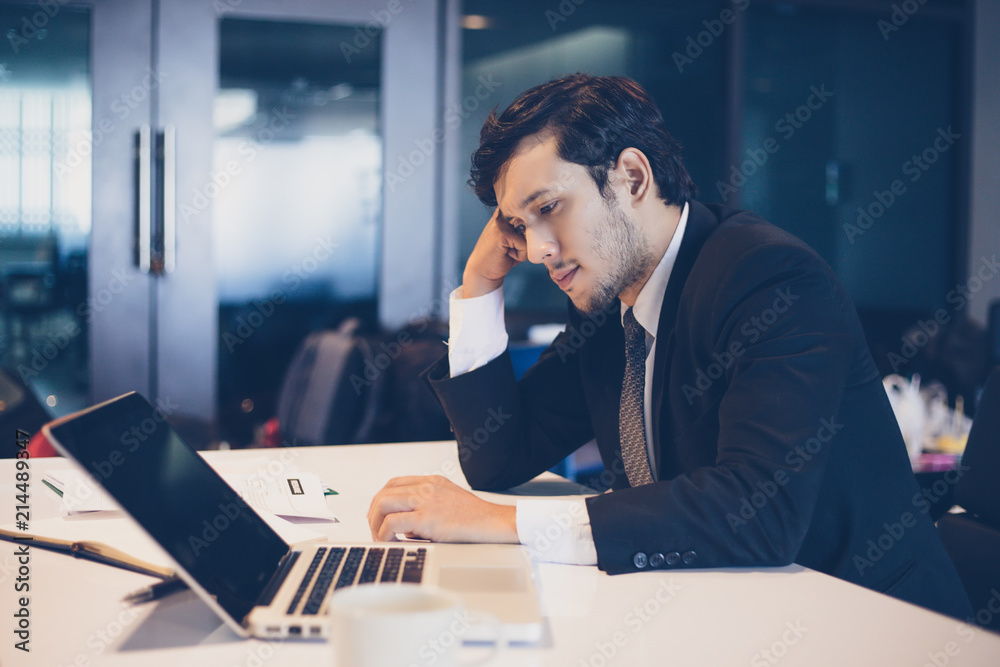businessman serious about the work hard done until the headache businessman serious about the work hard done until the headache