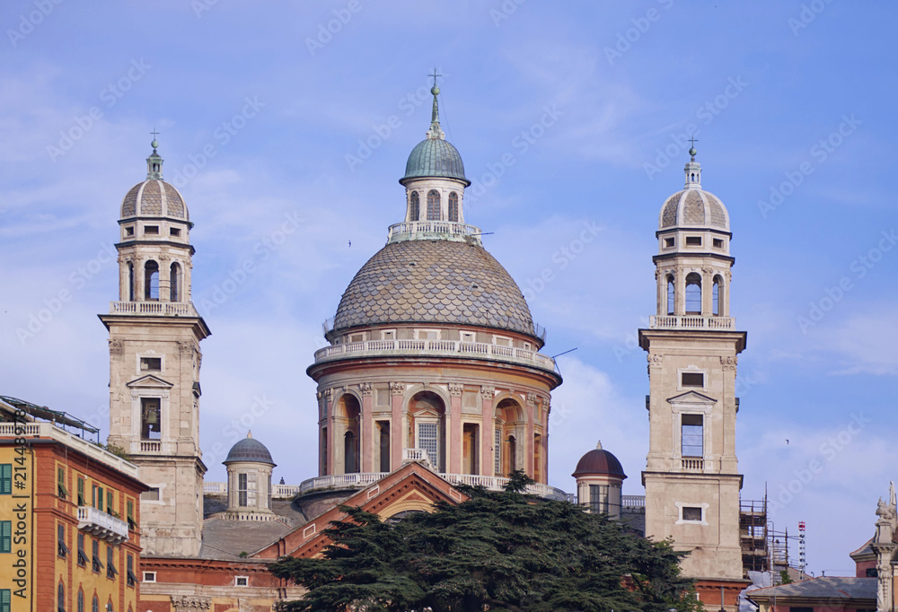 Genoa, Italy  - view from the harbor of the domes of the Santa Maria Assunta church in Renaissance style