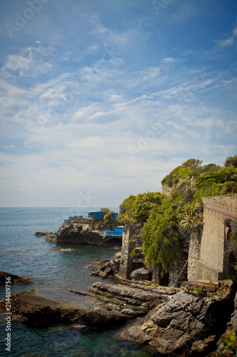 Panoramic view of the Tigullio gulf from the sea promenade on the rocky coast of Genoa Nervi, Liguria, Italy