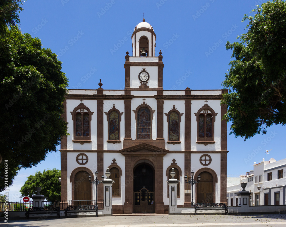 Agaete Church of the Concepction in Gran Canaria island, Spain. Religious architecture building on sunny day in Canary Islands. Popular landmark by main square. Tourism attraction concept