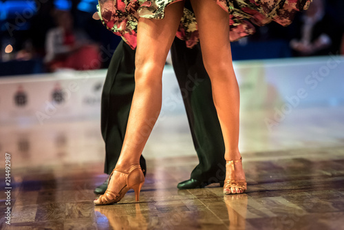 Dancing shoes feet and legs of female and male couple ballroom and latin