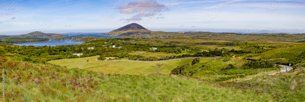 Trail in Connemara park with Ballynakill Bay with mountains in Letterfrack