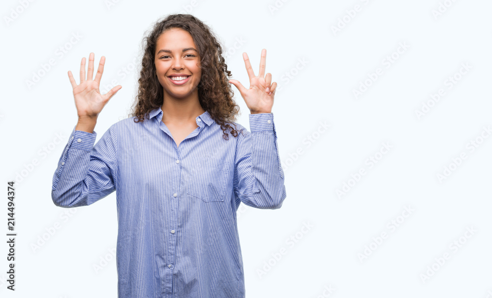 Young hispanic business woman showing and pointing up with fingers number eight while smiling confident and happy. Young hispanic business woman showing and pointing up with fingers number eight while smiling confident and happy.