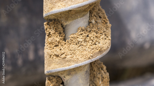 Geotechnical investigation, Drilling for soil samples - clayey sand (close up) photo
