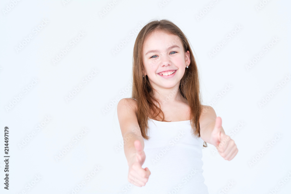 emotion face. happy smiling child giving thumbs up. little girl ...