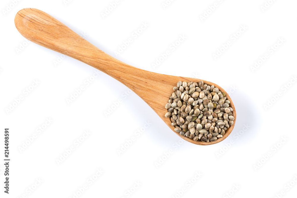 Cannabis Hemp seeds in spoon on white Cannabis Hemp seeds in spoon on white