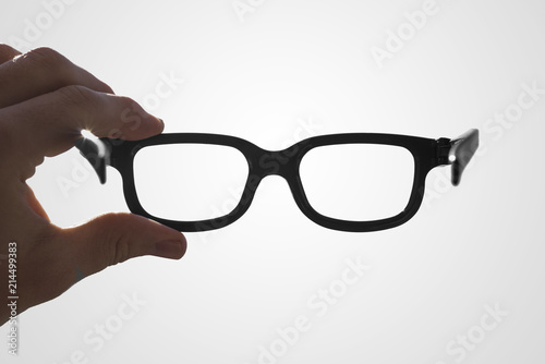 Hand holding glasses