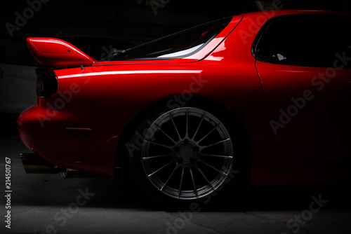 Car detailing series: Closeup of clean red sports car
