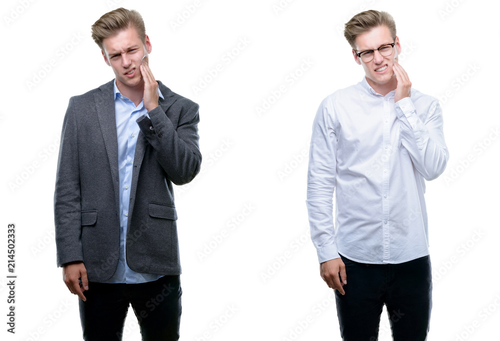 Young handsome blond business man wearing different outfits touching mouth with hand with painful expression because of toothache or dental illness on teeth. Dentist concept. Young handsome blond business man wearing different outfits touching mouth with hand with painful expression because of toothache or dental illness on teeth. Dentist concept.