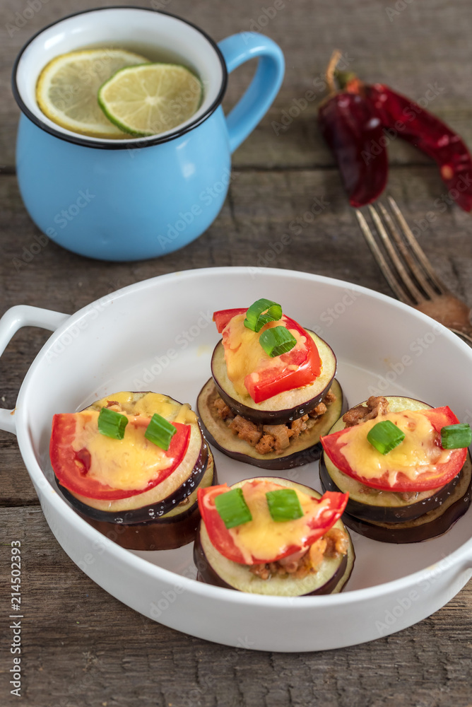Gratin eggplant with minced meat, tomatoes and cheese. Gratin eggplant with minced meat, tomatoes and cheese.