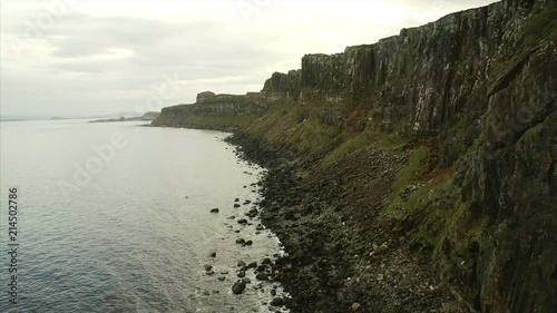 Flying by the Cliffs and Bay Near Neist Point in Skye Scotland photo