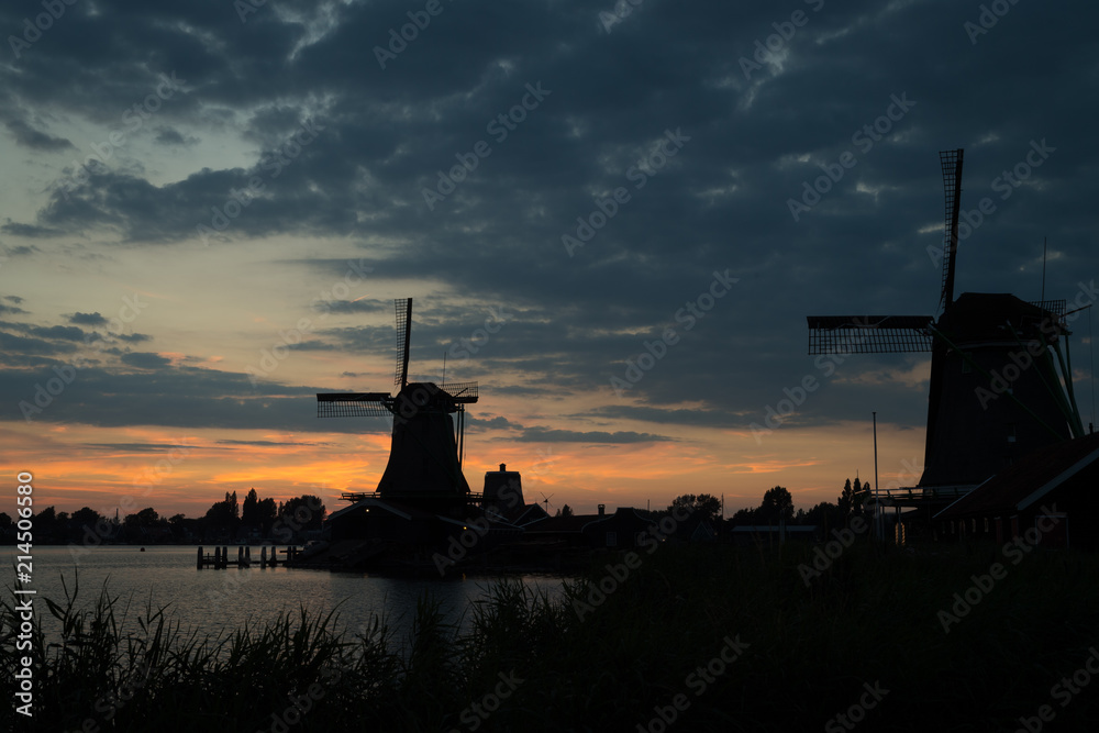 Dutch windmills at the summer sunset  in Zaanse Schans, Netherlands