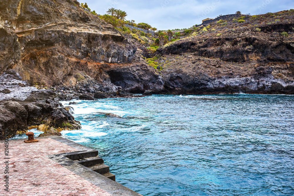 Tenerife, Canary islands, Spain - view of the beautiful Atlantic ocean coast with rocks and stones
