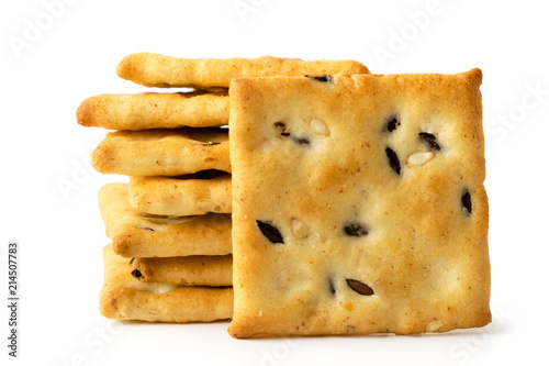 Cookie cracker with sesame and flax seeds on a white, isolated. photo