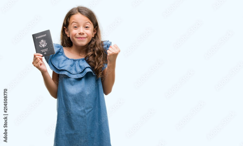 Brunette hispanic girl holding passport of United States of America screaming proud and celebrating victory and success very excited, cheering emotion Brunette hispanic girl holding passport of United States of America screaming proud and celebrating victory and success very excited, cheering emotion