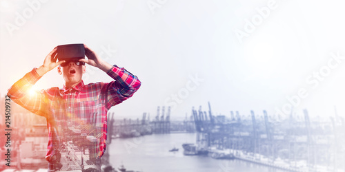Guy wearing checked shirt and virtual mask demonstrating shock or surprise