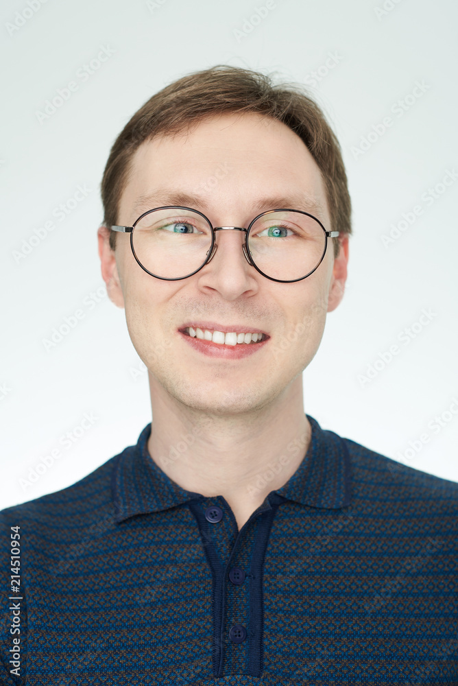 Portrait of young caucasian man in glasses Portrait of young caucasian man in glasses