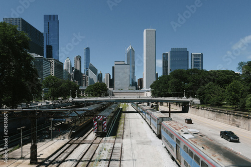 Skyscrapers over trains and train tracks in Chicago, USA